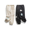 Pantalons pour hommes, fabricant OEM, Leggings amples brod&eacute;s avec appliques, jogging d&eacute;contract&eacute; de rue, pantalons personnalis&eacute;s pour hommes
