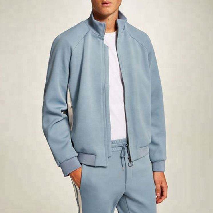 El nuevo estilo personaliz&oacute; los deportes de encargo de los hombres de las sudaderas con capucha que ejecutan los sistemas de dos piezas de los ch&aacute;ndales de los ch&aacute;ndales llanos