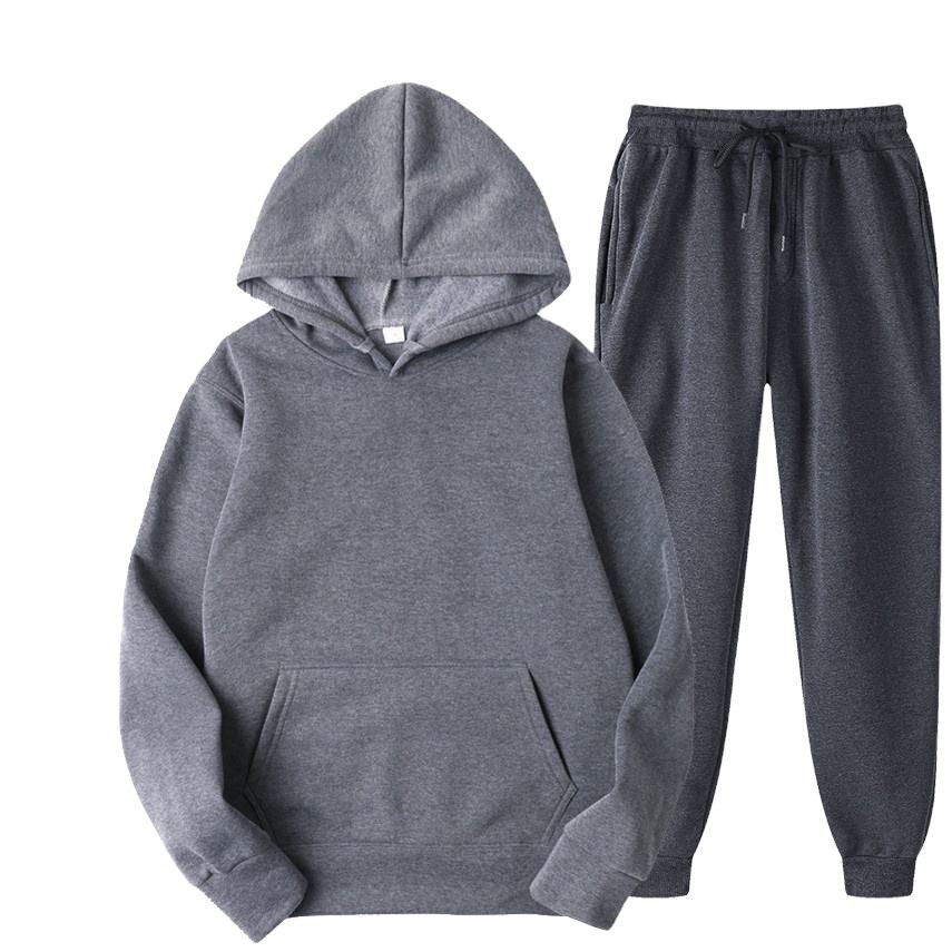 O Hoodie feito sob encomenda do Gym dos homens do algod&atilde;o da aptid&atilde;o e a cal&ccedil;a ajustaram o fato de treino dos homens