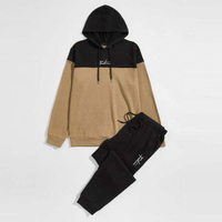 Oem 사용자 정의 로고 남성 스포츠 착용 컬러 블록 까마귀 블랙 조깅 세트 남성 두 조각 매칭 운동복