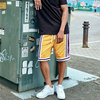 Korkealaatuiset Oem Sportswear -koripalloshortsit Custom Color Block -raidalliset koristeet Miesten verkkoshortsit vetoketjutaskulla