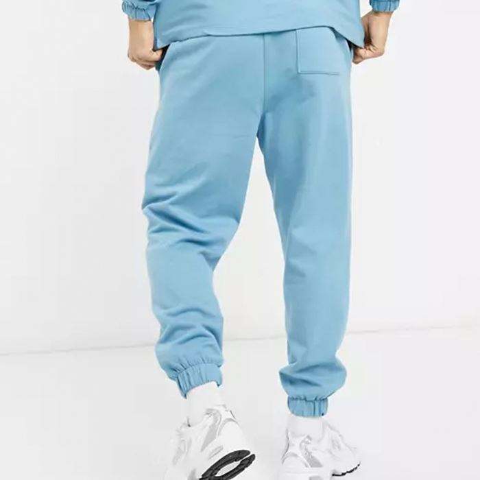 Pantaloni sportivi affusolati da uomo oversize con polsini elastici personalizzati Oem